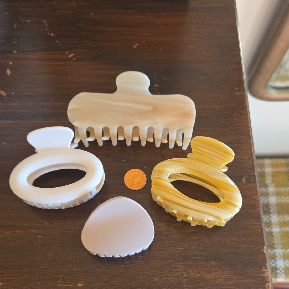 Set of The Hair Edit Claw Clips In Neutrals, Penny For Scale.